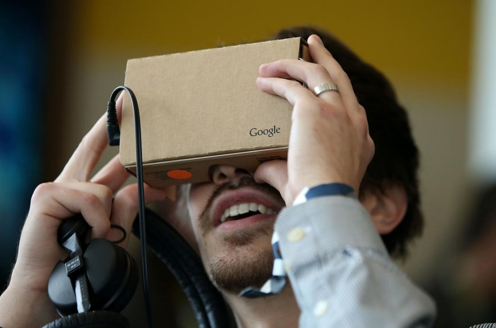 SAN FRANCISCO, CA - MAY 28: An attendee inspects Google Cardboard during the 2015 Google I/O conference on May 28, 2015 in San Francisco, California. The annual Google I/O conference runs through May 29. (Photo by Justin Sullivan/Getty Images)