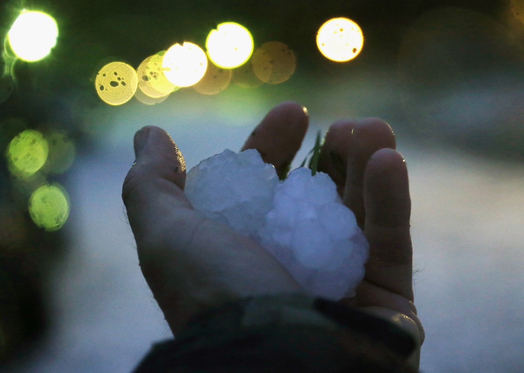 Two overnight storms produce hail, some reported to be as large as tennis balls, on March 17, 2016 in Fort Worth, Texas. (Rodger Mallison/Fort Worth Star-Telegram/TNS)