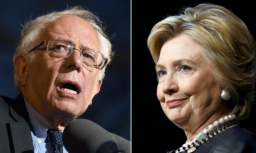This combination of file photos shows Democratic presidential hopefuls Bernie Sanders(L)on March 31, 2016 and Hillary Clinton on March 30, 2016, US presidential primaries spark back to life April 5, 2016 after an eventful 10-day break. For Clinton, a loss in Wisconsin would be more symbolic than anything else, as the state distributes delegates proportionally according to the primary results. But she comes into the contest having lost five of the last six states to Bernie Sanders, and polls show him finishing on top in Wisconsin. / AFP / PHOTO DESK
