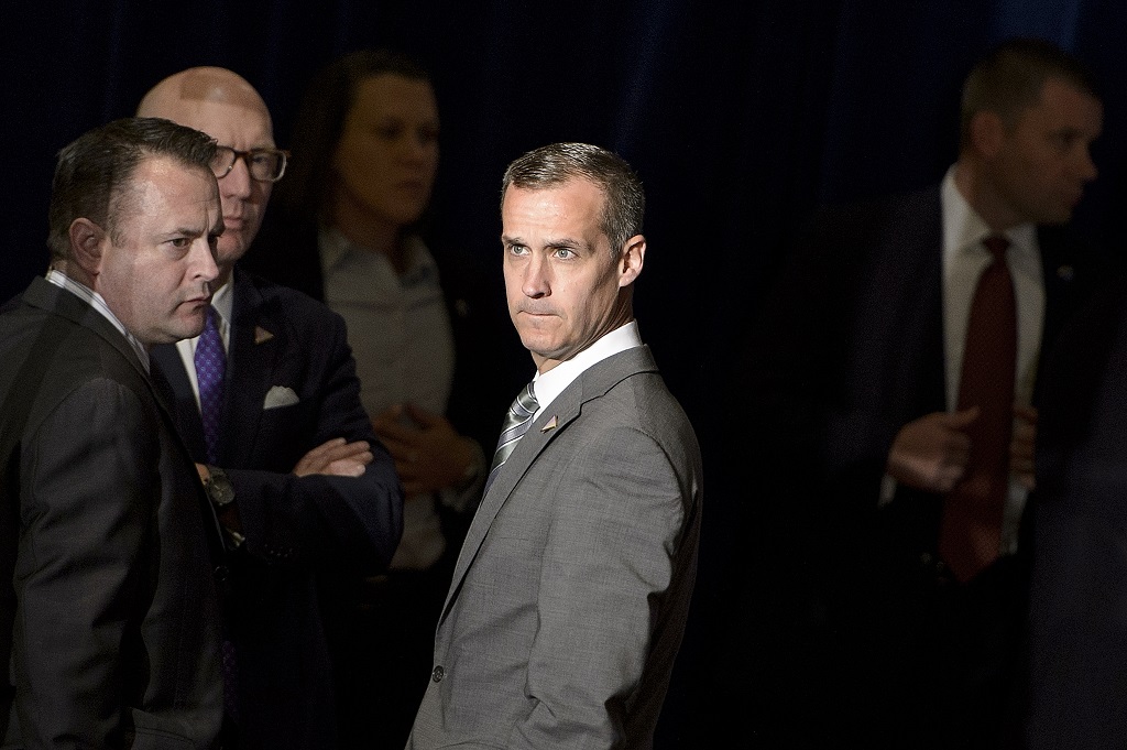 (FILES) This file photo taken on April 27, 2016 shows Trump campaign manager Corey Lewandowski as he waits for Republican US presidential hopeful Donald Trump to speak about foreign policy at the Mayflower Hotel in Washington, DC. Republican presidential hopeful Donald Trump has dropped his controversial campaign manager Corey Lewandowski, a spokeswoman told The New York Times on June 20, 2016, as the billionaire looks to reposition himself for the general election. "The Donald J. Trump Campaign for President, which has set a historic record in the Republican primary having received almost 14 million votes, has today announced that Corey Lewandowski will no longer be working with the campaign," spokeswoman Hope Hicks told the newspaper in a statement. / AFP PHOTO / Brendan Smialowski