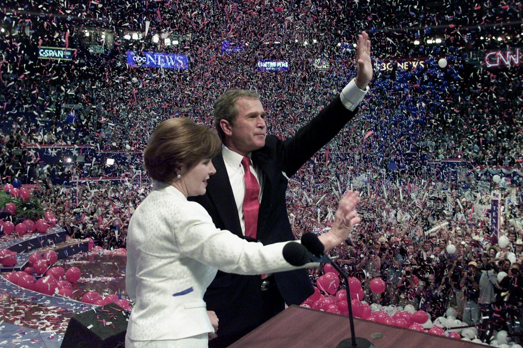 Republican presidential nominee George W. Bush and his wife Laura wave to the crowd after his acceptance speech at the 2000 Republican National Convention at the First Union Center in Philadelphia, PA, 03 August, 2000. (ELECTRONIC IMAGE) AFP PHOTO Timothy A. CLARY / AFP PHOTO / TIMOTHY A. CLARY