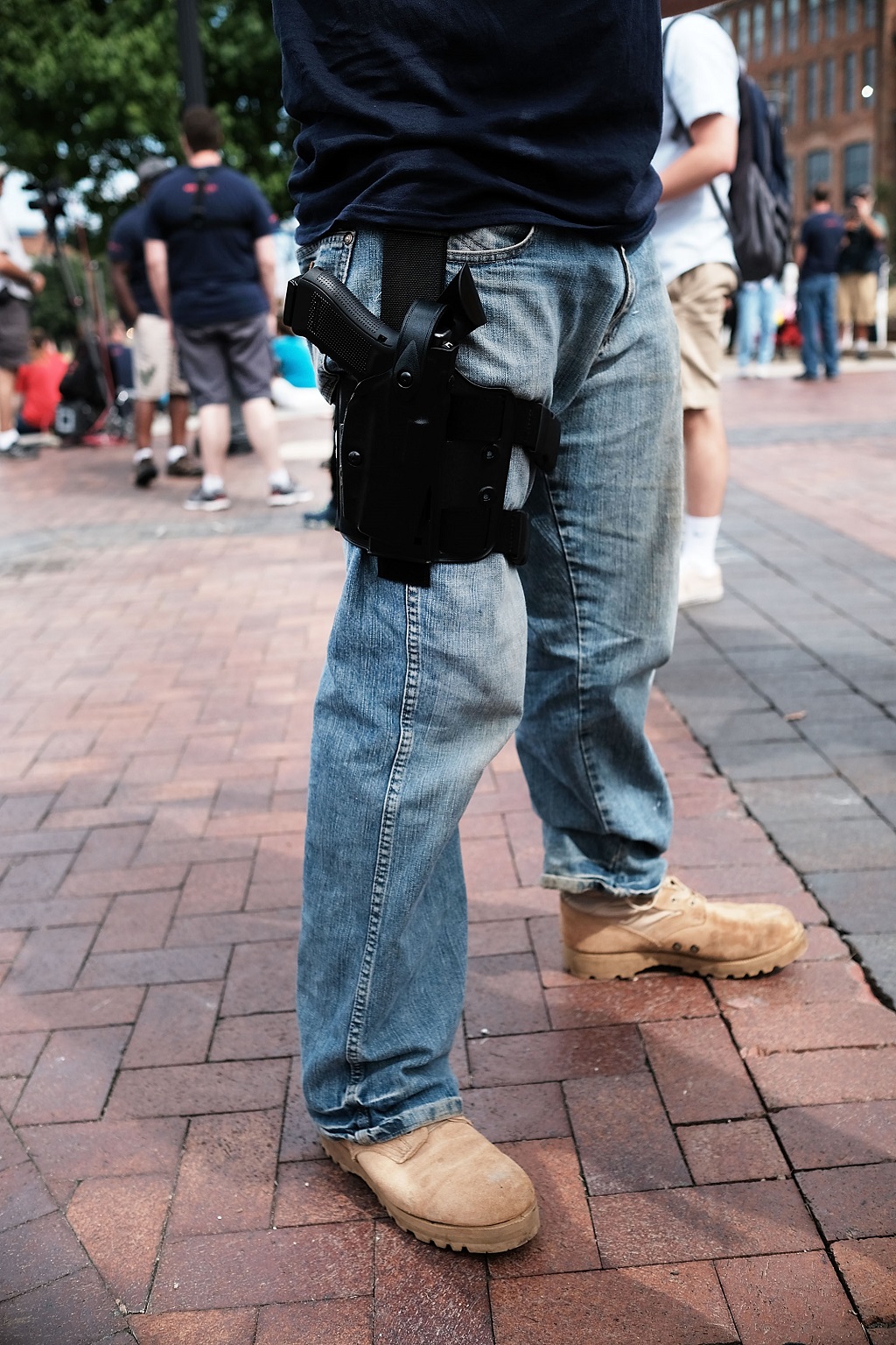 CLEVELAND, OH - JULY 18: A Trump supporter attends a rally with his pistol in downtown Cleveland in the first day of the Republican National Convention (RNC) on July 18, 2016 in Cleveland, Ohio. An estimated 50,000 people are expected in Cleveland, including hundreds of protesters and members of the media. The convention runs through July 21. Spencer Platt/Getty Images/AFP / AFP PHOTO / GETTY IMAGES NORTH AMERICA / SPENCER PLATT