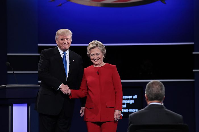 (L-R) Republican presidential nominee Donald Trump and Democratic presidential nominee Hillary Clinton shake hands prior to the start of the Presidential Debate at Hofstra University on September 26, 2016 in Hempstead, New York. The first of four debates for the 2016 Election, three Presidential and one Vice Presidential, is moderated by NBC's Lester Holt.