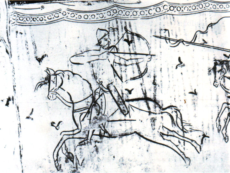 Hátrafelé nyilazó magyar harcos az aquileai székesegyház freskóján (Wikipedia)