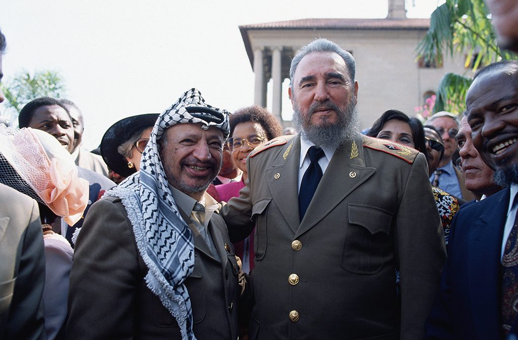 PLO leader Yasser Arafat and Cuban dictator Fidel Castro at the inauguration ceremony for South African president Nelson Mandela. (Photo by Peter Turnley/Corbis/VCG via Getty Images)