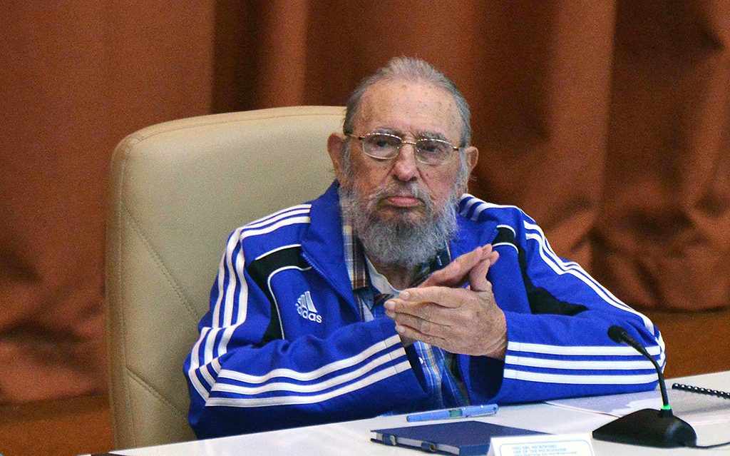 Handout picture released by Cuban Agency ACN showing Cuban Former President Fidel Castro applauding during the closing ceremony of VII Congress of Cuban Communist Party (PCC) at Convention Palace in Havana, on April 19, 2016. "Cuba will never permit the application of so-called shock therapies, which are frequently applied to the detriment of society's most humble classes," said Raul Castro in a lengthy speech opening the congress, which takes place every five years and will stretch on for several days. / AFP PHOTO / ACN / OMARA GARCIA MEDEROS / RESTRICTED TO EDITORIAL USE - MANDATORY CREDIT "AFP PHOTO / AGENCIA CUBANA DE NOTICIAS" - NO MARKETING NO ADVERTISING CAMPAIGNS - DISTRIBUTED AS A SERVICE TO CLIENTS