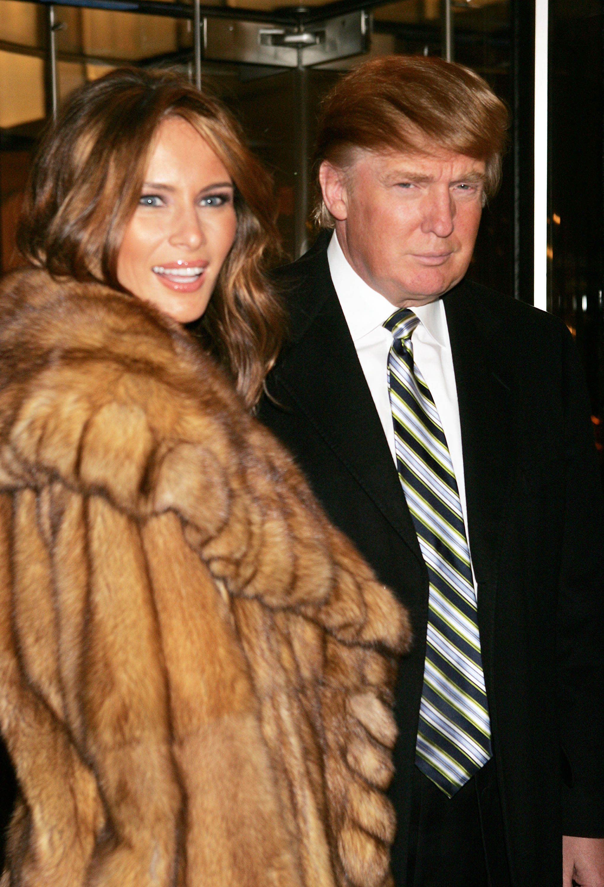 NEW YORK - DECEMBER 13: Businessman Donald Trump and his fiance Melania Knauss arrive at a gala to honor leaders in tourism sponsored by NYC & Company at the Museum of Modern Art December 13, 2004 in New York City. (Photo by Scott Gries/Getty Images)