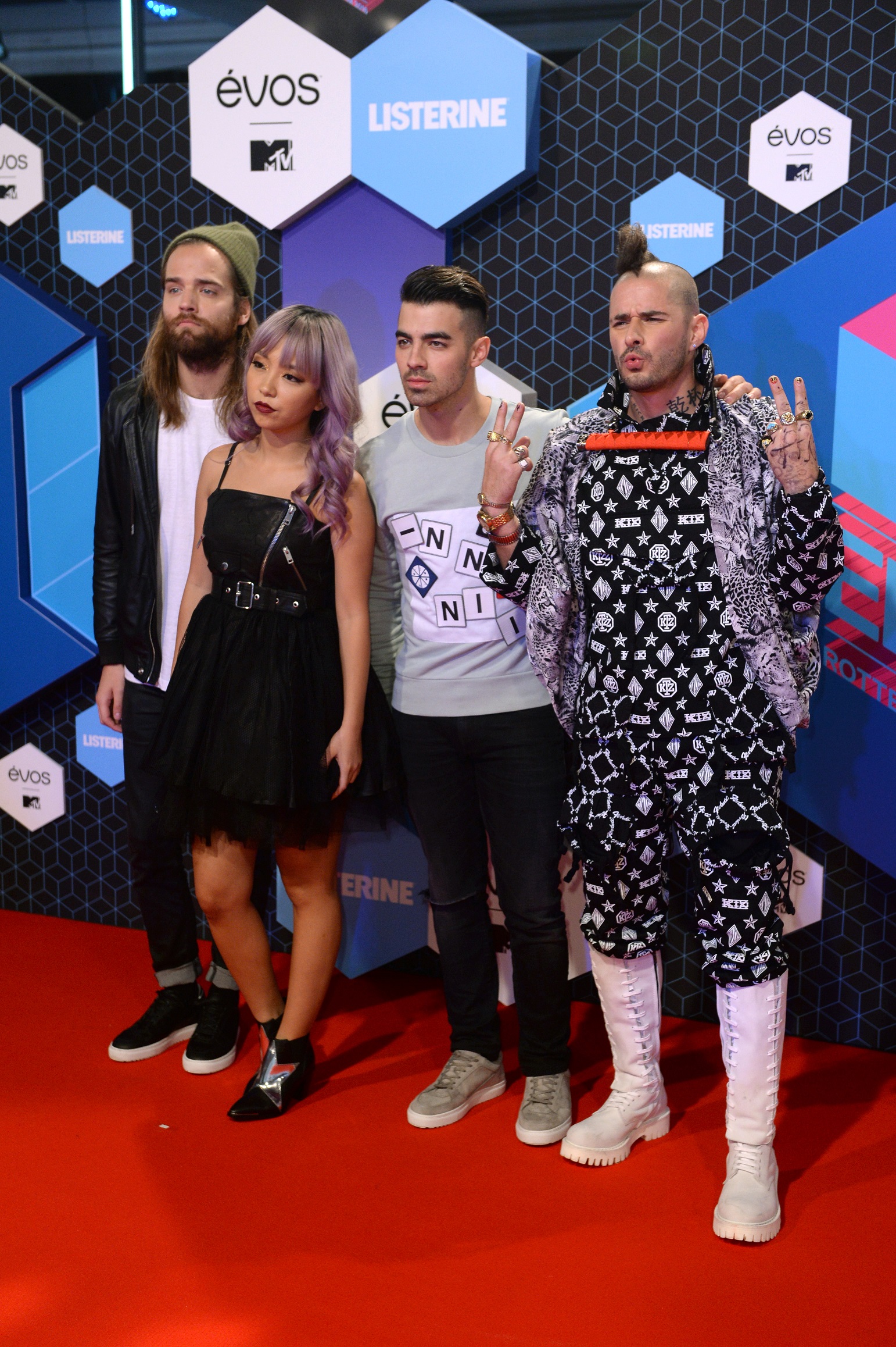 ROTTERDAM, NETHERLANDS - NOVEMBER 06: (L-R) Jack Lawless, JinJoo Lee, Joe Jonas and Cole Whittle of DNCE attend the MTV Europe Music Awards 2016 on November 6, 2016 in Rotterdam, Netherlands. (Photo by Anthony Harvey/Getty Images for MTV)