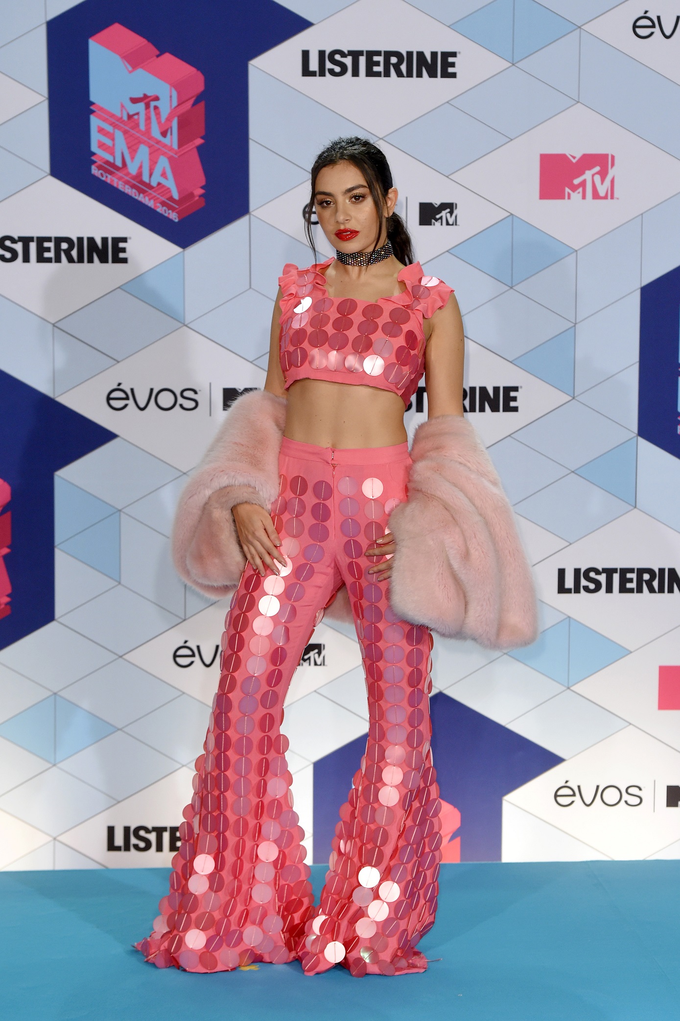 ROTTERDAM, NETHERLANDS - NOVEMBER 06: Charli XCX poses in the winner's room after presenting the award for Best Electronic to Martin Garrix award during the MTV Europe Music Awards 2016 on November 6, 2016 in Rotterdam, Netherlands. (Photo by Anthony Harvey/Getty Images for MTV)