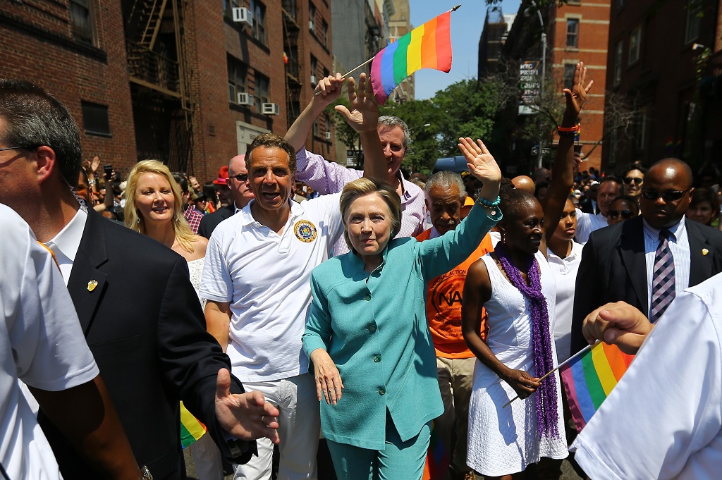 NEW YORK, NY - JUNE 26: Democratic Presidential candidate Hillary Clinton (C) greets people as she marches in the 46th annual New York City Gay Pride Parade in New York, New York, USA, on 26 June 2016. (Photo by Volkan Furuncu/Anadolu Agency/Getty Images)