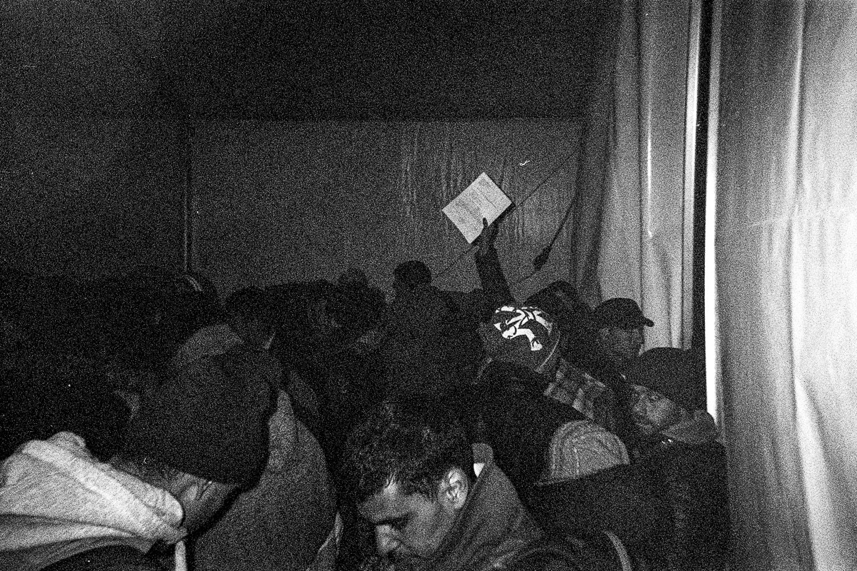 Authorities hand out papers to refugees, who are allowed to take the train through macedonia. Refugees, who didn't receive a paper because of invalid or wrong documents had to return to the greek side of the border.