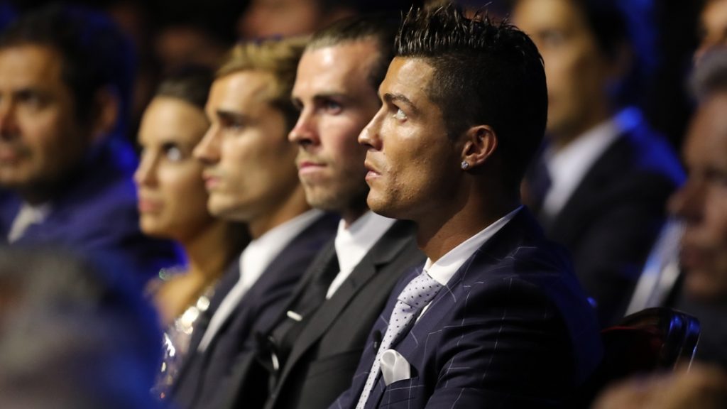 Real Madrid's Portuguese forward Cristiano Ronaldo looks on during the UEFA Champions League Group stage draw ceremony, on August 25, 2016 in Monaco. / AFP PHOTO / Valery HACHE