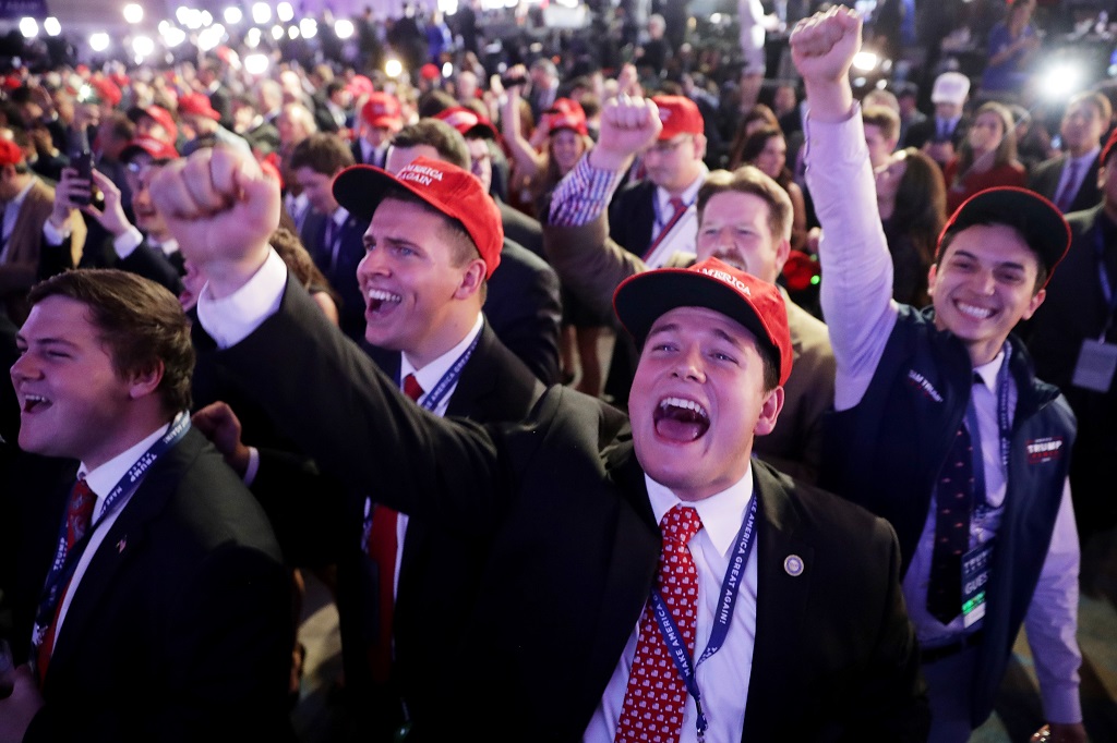 NEW YORK, NY - NOVEMBER 08: Supporters of Republican presidential nominee Donald Trump cheer during the election night event at the New York Hilton Midtown on November 8, 2016 in New York City. Americans today will choose between Republican presidential nominee Donald Trump and Democratic presidential nominee Hillary Clinton as they go to the polls to vote for the next president of the United States. (Photo by Chip Somodevilla/Getty Images)