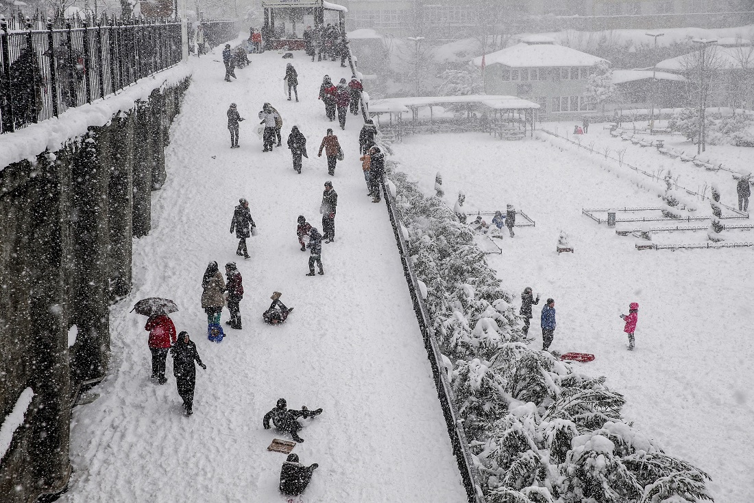 ISTANBUL, TURKEY - JANUARY 9: People enjoy the snow during heavy snowfall at Fatih district of Istanbul, Turkey on January 9, 2017.   Arif Hudaverdi Yaman / Anadolu Agency