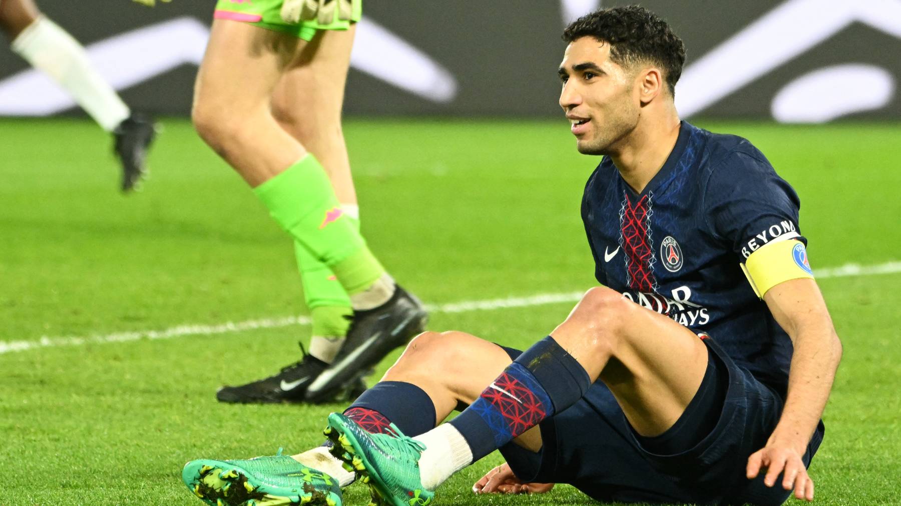 Paris Saint-Germain's Moroccan defender #02 Achraf Hakimi reacts during the French L1 football match between Paris Saint-Germain (PSG) and FC Metz at the Parc des Princes stadium in Paris on February 21, 2026.