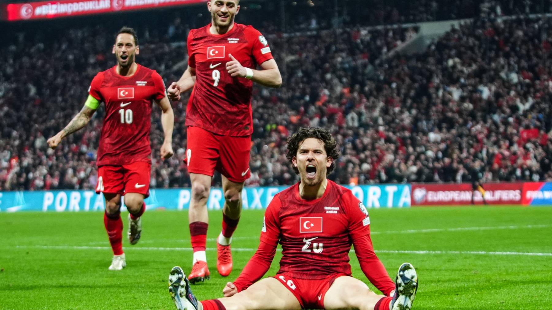 ISTANBUL, TURKIYE - MARCH 26: Ferdi Kadioglu (20) celebrates with his teammates after scoring a goal during the 2026 FIFA World Cup European Qualifiers play-off semifinal match between Turkiye and Romania at Tupras Stadium in Istanbul, Turkiye on March 26, 2026. Hakan Akgun / Anadolu