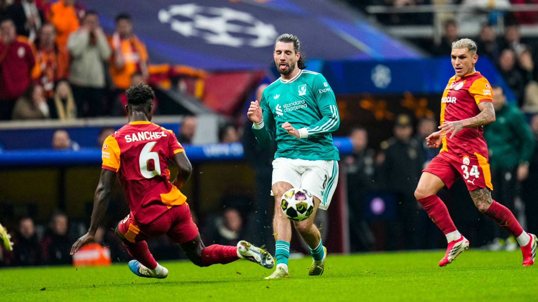 Dominik Szoboszlai of Liverpool FC is in action with Davinson Sanchez of Galatasaray A.S. during the UEFA Champions League 2025/26 Round of 16 First Leg match between Galatasaray A.S. and Liverpool FC at Ali Sami Yen Spor Kompleksi in Istanbul, Turkey, on March 10, 2026. (Photo by Yagiz Gurtug/NurPhoto)